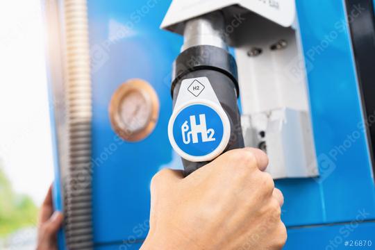 Aachen, Germany, January 2021: Man hold a fuel dispenser with hydrogen on gas station. h2 combustion engine for emission free eco friendly transport.  : Stock Photo or Stock Video Download rcfotostock photos, images and assets rcfotostock | RC Photo Stock.: