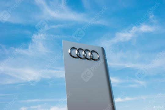 AACHEN, GERMANY MARCH, 2017: Audi dealership logo against blue sky. Audi is a German automobile manufacturer that designs, engineers, produces, markets and distributes luxury automobiles.  : Stock Photo or Stock Video Download rcfotostock photos, images and assets rcfotostock | RC Photo Stock.: