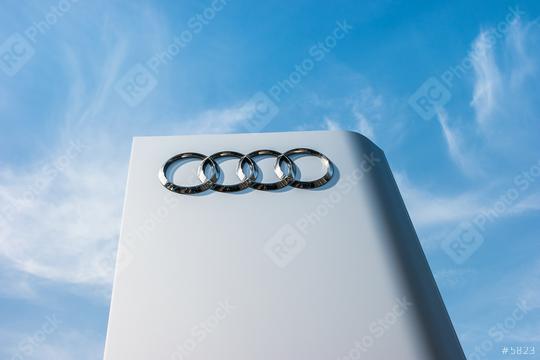 AACHEN, GERMANY MARCH, 2017: Audi dealership sign against blue sky. Audi is a German automobile manufacturer that designs, engineers, produces, markets and distributes luxury automobiles.  : Stock Photo or Stock Video Download rcfotostock photos, images and assets rcfotostock | RC Photo Stock.: