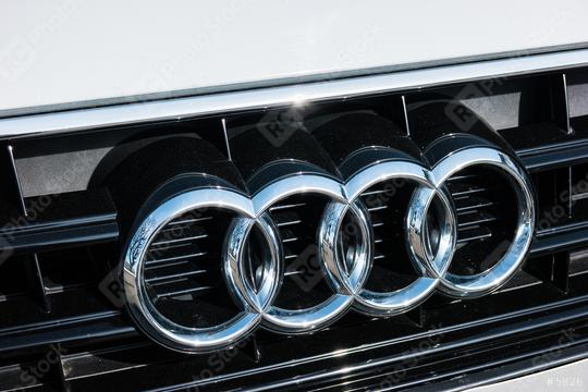 AACHEN, GERMANY MARCH, 2017: Audi emblem on a car grill. Audi is a German automobile manufacturer that designs, engineers, produces, markets and distributes luxury automobiles  : Stock Photo or Stock Video Download rcfotostock photos, images and assets rcfotostock | RC Photo Stock.: