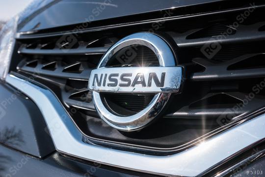 AACHEN, GERMANY MARCH, 2017: Close-up of Nissan logo on a car. Nissan Motor Corporation is a Japanese multinational automobile manufacturer headquartered in Nishi-ku, Yokohama, Japan.  : Stock Photo or Stock Video Download rcfotostock photos, images and assets rcfotostock | RC Photo Stock.: