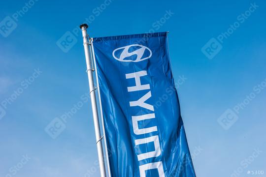AACHEN, GERMANY MARCH, 2017: Hyundai logo on a flag. Hyundai Motor Company is a South Korean multinational automotive manufacturer founded at 1967.  : Stock Photo or Stock Video Download rcfotostock photos, images and assets rcfotostock | RC Photo Stock.:
