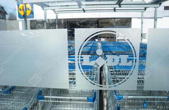 AACHEN, GERMANY MARCH, 2017: LIDL supermarket chain Logo with Shopping carts. LIDL is a German global discount supermarket chain, based in Neckarsulm, Baden-Wuerttemberg, Germany.  : Stock Photo or Stock Video Download rcfotostock photos, images and assets rcfotostock | RC Photo Stock.: