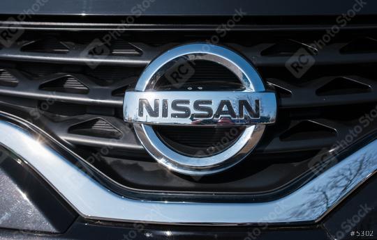 AACHEN, GERMANY MARCH, 2017: Nissan logo on a car grill. Nissan Motor Corporation is a Japanese multinational automobile manufacturer headquartered in Nishi-ku, Yokohama, Japan.  : Stock Photo or Stock Video Download rcfotostock photos, images and assets rcfotostock | RC Photo Stock.: