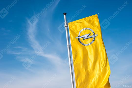 AACHEN, GERMANY MARCH, 2017: Opel flag against blue sky at the Opel Store. Opel AG is a German automobile manufacturer.  : Stock Photo or Stock Video Download rcfotostock photos, images and assets rcfotostock | RC Photo Stock.:
