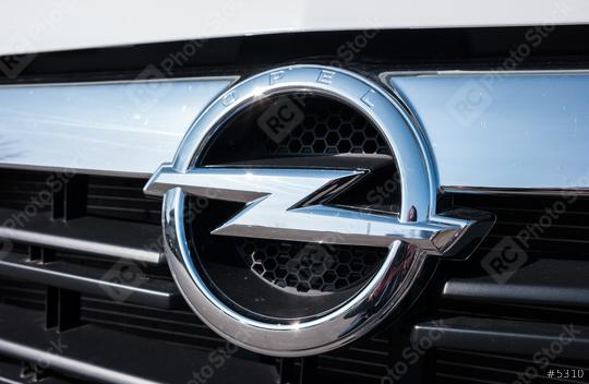 AACHEN, GERMANY MARCH, 2017: Opel logo on a car grilll. Opel AG is a German automobile manufacturer.  : Stock Photo or Stock Video Download rcfotostock photos, images and assets rcfotostock | RC Photo Stock.: