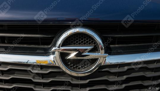 AACHEN, GERMANY MARCH, 2017: Opel logo on a car grilll. Opel AG is a German automobile manufacturer.  : Stock Photo or Stock Video Download rcfotostock photos, images and assets rcfotostock | RC Photo Stock.: