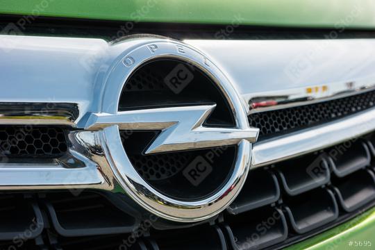 AACHEN, GERMANY MARCH, 2017: Opel logo on a green car. Opel AG is a German automobile manufacturer.  : Stock Photo or Stock Video Download rcfotostock photos, images and assets rcfotostock | RC Photo Stock.:
