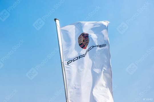 AACHEN, GERMANY MARCH, 2017: Porsche Logo on a flag. Ferdinand Porsche founded the company in 1931 with main offices in the centre of Stuttgart.  : Stock Photo or Stock Video Download rcfotostock photos, images and assets rcfotostock | RC Photo Stock.: