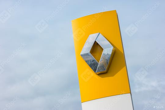 AACHEN, GERMANY MARCH, 2017: Renault dealership sign against cloudy sky. Renault S.A. is a French car manufacturer producing cars, vans, buses, trucks, tractors, tanks, autorail vehicles  : Stock Photo or Stock Video Download rcfotostock photos, images and assets rcfotostock | RC Photo Stock.: