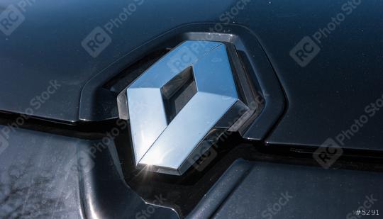 AACHEN, GERMANY MARCH, 2017: Renault logo close-up on a black car. Renault S.A. is a French car manufacturer producing cars, vans, buses, trucks, tractors, tanks, autorail vehicles  : Stock Photo or Stock Video Download rcfotostock photos, images and assets rcfotostock | RC Photo Stock.: