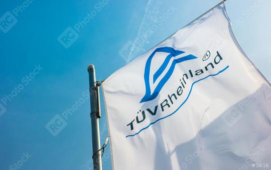 AACHEN, GERMANY MARCH, 2017: The Logo of the "TÜV Rheinland Deutschland" on a flag. The TÜV Rheinland AG is an internationally active, independent test service provider based in Cologne.  : Stock Photo or Stock Video Download rcfotostock photos, images and assets rcfotostock | RC Photo Stock.: