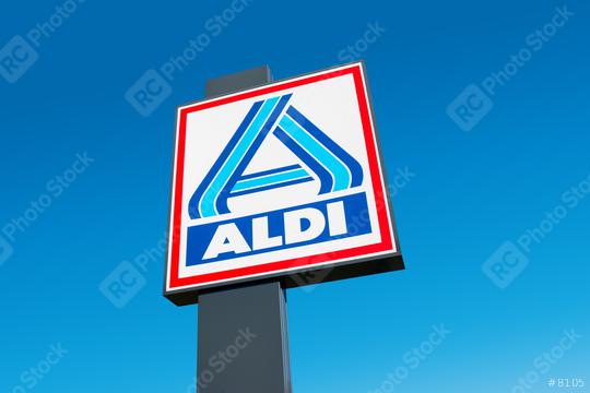 AACHEN, GERMANY OCTOBER, 2017: Aldi sign (north division) against blue sky. Aldi is a leading global discount supermarket chain with almost 10,000 stores in 18 countries.  : Stock Photo or Stock Video Download rcfotostock photos, images and assets rcfotostock | RC Photo Stock.: