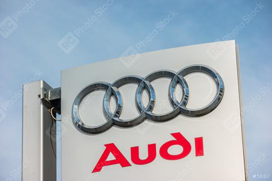 AACHEN, GERMANY OCTOBER, 2017: Audi dealership logo against blue sky. Audi is a German automobile manufacturer that designs, engineers, produces, markets and distributes luxury automobiles.  : Stock Photo or Stock Video Download rcfotostock photos, images and assets rcfotostock | RC Photo Stock.: