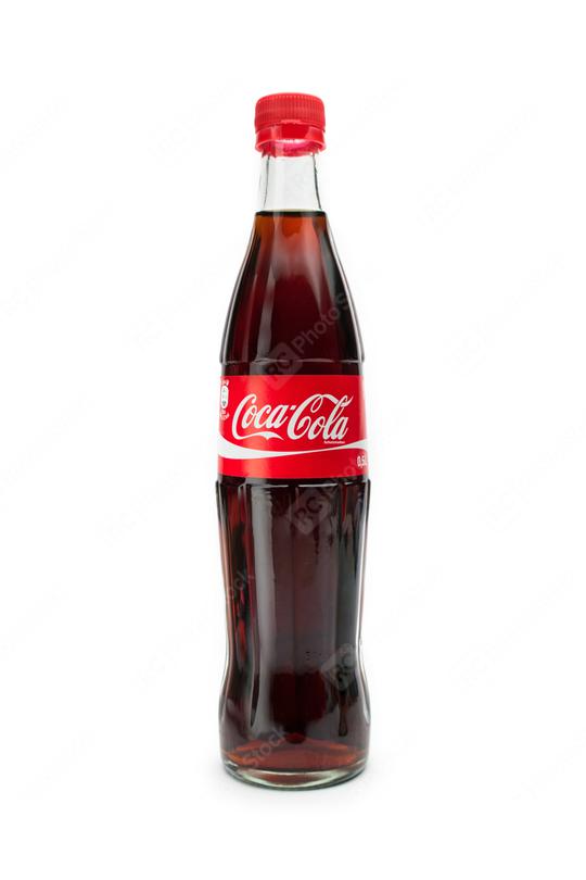 AACHEN, GERMANY OCTOBER, 2017: Classic bottle Of Coca-Cola in a glass bottle isolated on white background. Coca-Cola is a carbonated non-alcoholic beverage sold all over the world.  : Stock Photo or Stock Video Download rcfotostock photos, images and assets rcfotostock | RC Photo Stock.: