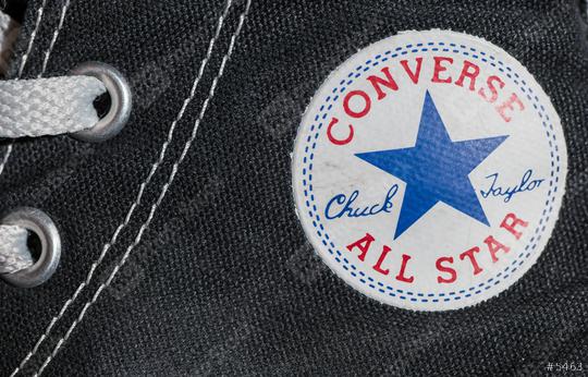 AACHEN, GERMANY OCTOBER, 2017: Converse All star logo printed on the side of the shoe. Founded in 1908 is an American lifestyle company with a production output of shoes and lifestyle fashion.  : Stock Photo or Stock Video Download rcfotostock photos, images and assets rcfotostock | RC Photo Stock.: