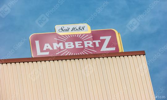 AACHEN, GERMANY OCTOBER, 2017: Lambertz Logo on a factory building. The Lambertz Group is a Aachener Printen- and chocolate factory founded by Henry Lambertz 1688 and a manufacturer Christmas cookies.  : Stock Photo or Stock Video Download rcfotostock photos, images and assets rcfotostock | RC Photo Stock.: