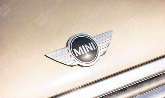 AACHEN, GERMANY OCTOBER, 2017: Mini cooper logo on a golden car. It is a model produced by BMW since 2000. BMW is a German luxury vehicle, motorcycle, and engine manufacturing company founded in 1916.  : Stock Photo or Stock Video Download rcfotostock photos, images and assets rcfotostock | RC Photo Stock.: