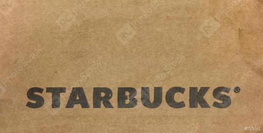 AACHEN, GERMANY OCTOBER, 2017: Starbucks Logo on a paper bag. Starbucks is the largest coffeehouse company in the world, with 20,891 stores in 62 countries.  : Stock Photo or Stock Video Download rcfotostock photos, images and assets rcfotostock | RC Photo Stock.: