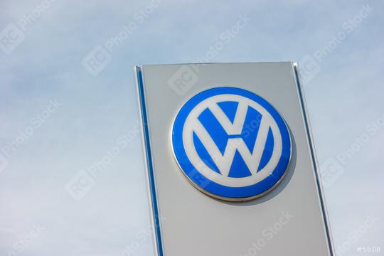 AACHEN, GERMANY OCTOBER, 2017: Volkswagen sign against cloudy sky. Volkswagen is the biggest German automaker and the third largest automaker in the world.  : Stock Photo or Stock Video Download rcfotostock photos, images and assets rcfotostock | RC Photo Stock.: