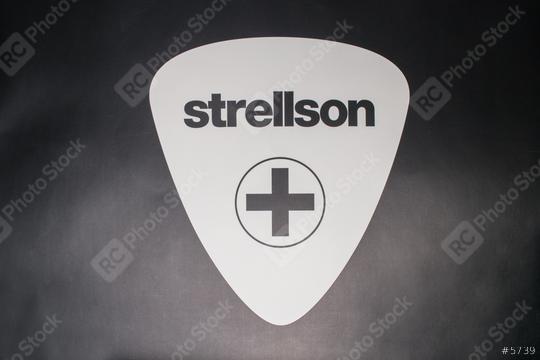 AACHEN, GERMANY OCTOBER, 2017: White Logo of "Strellson". Strellson was created in 1984 by the Strellson AG. The product range mainly includes suits, trousers, shirts, sweaters, bags and shoes.   : Stock Photo or Stock Video Download rcfotostock photos, images and assets rcfotostock | RC Photo Stock.: