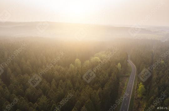 Aerial drone view of a scenic highway to the beautiful Landscape with mountains covered in clouds and fog.  : Stock Photo or Stock Video Download rcfotostock photos, images and assets rcfotostock | RC Photo Stock.: