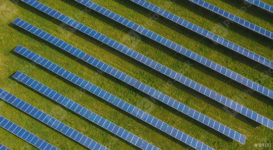 Aerial top down photo of solar panels PV modules mounted on ground photovoltaic solar panels absorb sunlight as a source of energy to generate electricity creating sustainable energy  : Stock Photo or Stock Video Download rcfotostock photos, images and assets rcfotostock | RC Photo Stock.:
