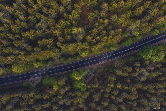 Aerial view of a road in the middle of the forest  : Stock Photo or Stock Video Download rcfotostock photos, images and assets rcfotostock | RC Photo Stock.: