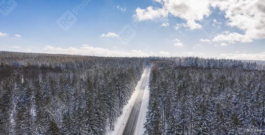 Aerial view of cars driving by the road through the forest covered by snow in winter and cloudy sky, including Copy space  : Stock Photo or Stock Video Download rcfotostock photos, images and assets rcfotostock | RC Photo Stock.: