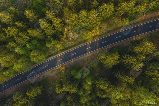 Aerial view of countryside road passing through the green forrest and mountain  : Stock Photo or Stock Video Download rcfotostock photos, images and assets rcfotostock | RC Photo Stock.: