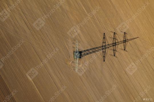 Aerial view of power line in a agricultural plowed field prepared for planting. shoot from drone directly above  : Stock Photo or Stock Video Download rcfotostock photos, images and assets rcfotostock | RC Photo Stock.: