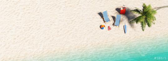 Aerial view of sandy beach and ocean and beach chair with beach ball flip-flop sandals, umbrella and suit case under a palm tree at the beach during a summer vacation in the Caribbean, with copy space  : Stock Photo or Stock Video Download rcfotostock photos, images and assets rcfotostock | RC Photo Stock.: