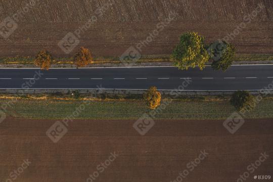 Aerial view of traffic on two lane road through countryside and cultivated fields at autumn  : Stock Photo or Stock Video Download rcfotostock photos, images and assets rcfotostock | RC Photo Stock.: