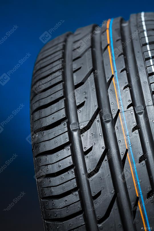 all season car tire on blue background  : Stock Photo or Stock Video Download rcfotostock photos, images and assets rcfotostock | RC Photo Stock.: