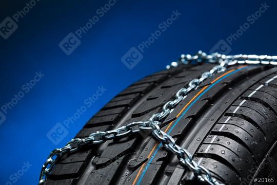 all season tire with snow chains on blue background  : Stock Photo or Stock Video Download rcfotostock photos, images and assets rcfotostock | RC Photo Stock.: