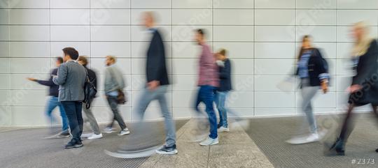 Anonymous blurred business people are walking around on a modern trade fair  : Stock Photo or Stock Video Download rcfotostock photos, images and assets rcfotostock | RC Photo Stock.: