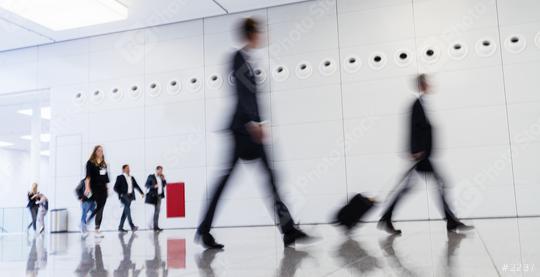 Anonymous blurred business people rush through trade fair hall or airport  : Stock Photo or Stock Video Download rcfotostock photos, images and assets rcfotostock | RC Photo Stock.: