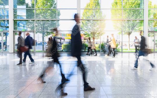 Anonymous blurred business people rush through trade fair hall or airport  : Stock Photo or Stock Video Download rcfotostock photos, images and assets rcfotostock | RC Photo Stock.: