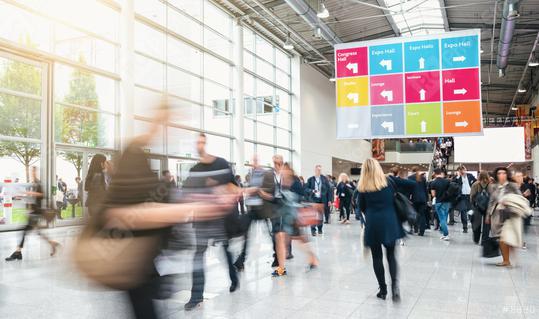 Anonymous blurred business people rushing in a hall of a trade fair  : Stock Photo or Stock Video Download rcfotostock photos, images and assets rcfotostock | RC Photo Stock.: