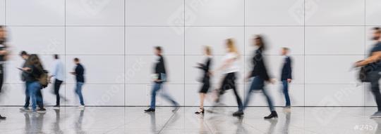 Anonymous blurred business people walk around in the office or at the trade fair  : Stock Photo or Stock Video Download rcfotostock photos, images and assets rcfotostock | RC Photo Stock.: