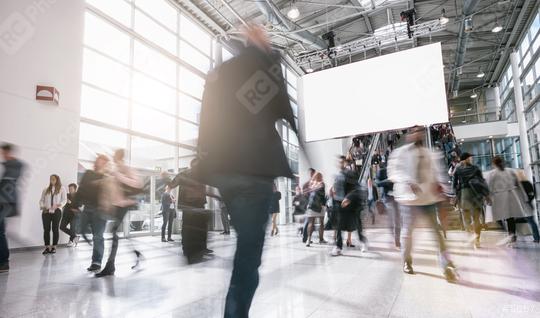Anonymous blurred business people walking in a hall of a Exhibition  : Stock Photo or Stock Video Download rcfotostock photos, images and assets rcfotostock | RC Photo Stock.: