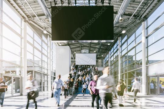 Anonymous Blurred businesspeople at a trade fair  : Stock Photo or Stock Video Download rcfotostock photos, images and assets rcfotostock | RC Photo Stock.: