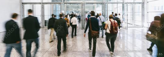 Anonymous blurred crowd on the go at a business trade fair  : Stock Photo or Stock Video Download rcfotostock photos, images and assets rcfotostock | RC Photo Stock.:
