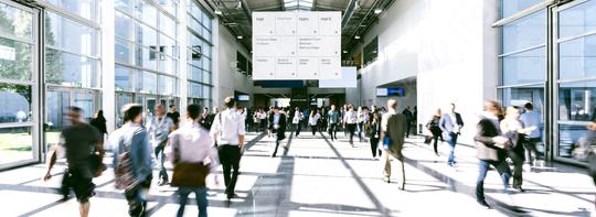 Anonymous blurred people walking in a hall of a Exhibition  : Stock Photo or Stock Video Download rcfotostock photos, images and assets rcfotostock | RC-Photo-Stock.:
