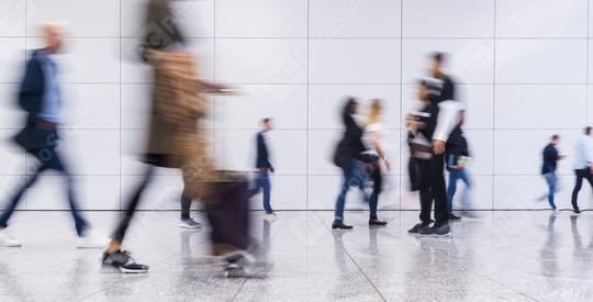 Anonymous crowd of business people go by gear on a trade fair  : Stock Photo or Stock Video Download rcfotostock photos, images and assets rcfotostock | RC Photo Stock.: