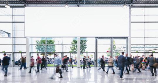 Anonymous Crowd of business people walking at a trade fair - concept image  : Stock Photo or Stock Video Download rcfotostock photos, images and assets rcfotostock | RC Photo Stock.: