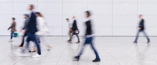Anonymous crowd People is walking in trade fair or airport in one direction  : Stock Photo or Stock Video Download rcfotostock photos, images and assets rcfotostock | RC Photo Stock.: