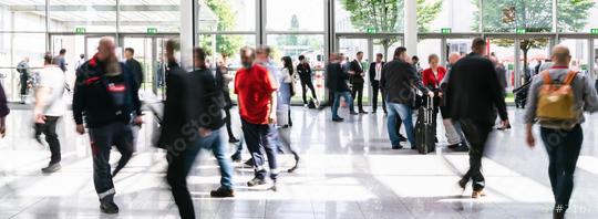 Anonymous crowd people walks in a trade fair hall  : Stock Photo or Stock Video Download rcfotostock photos, images and assets rcfotostock | RC Photo Stock.: