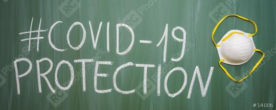 Anti virus protection mask ffp2  standart to prevent corona COVID-19 infection on green chalkboard  : Stock Photo or Stock Video Download rcfotostock photos, images and assets rcfotostock | RC Photo Stock.: