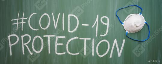 Anti virus protection mask ffp3  standart to prevent corona COVID-19 infection on green chalkboard  : Stock Photo or Stock Video Download rcfotostock photos, images and assets rcfotostock | RC Photo Stock.: